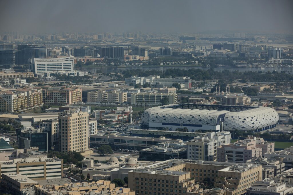 Stunning aerial shot of Dubai's cityscape featuring modern and traditional architecture.